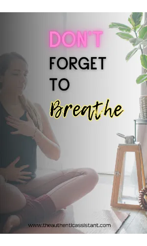 A woman sitting comfortably on the floor taking some deep breathes. Don't forget to breathe.