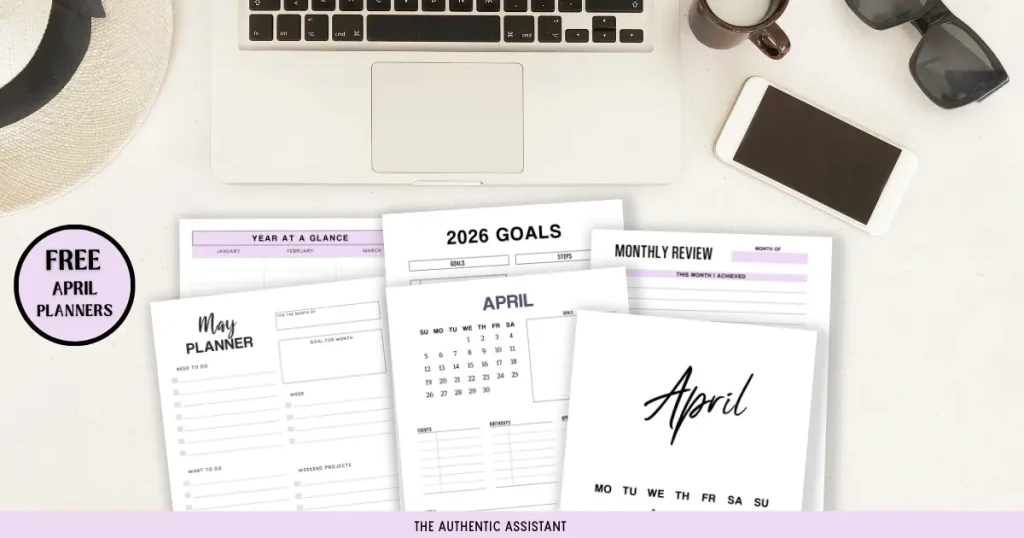 Desk top view with a selection of free printable planners for April